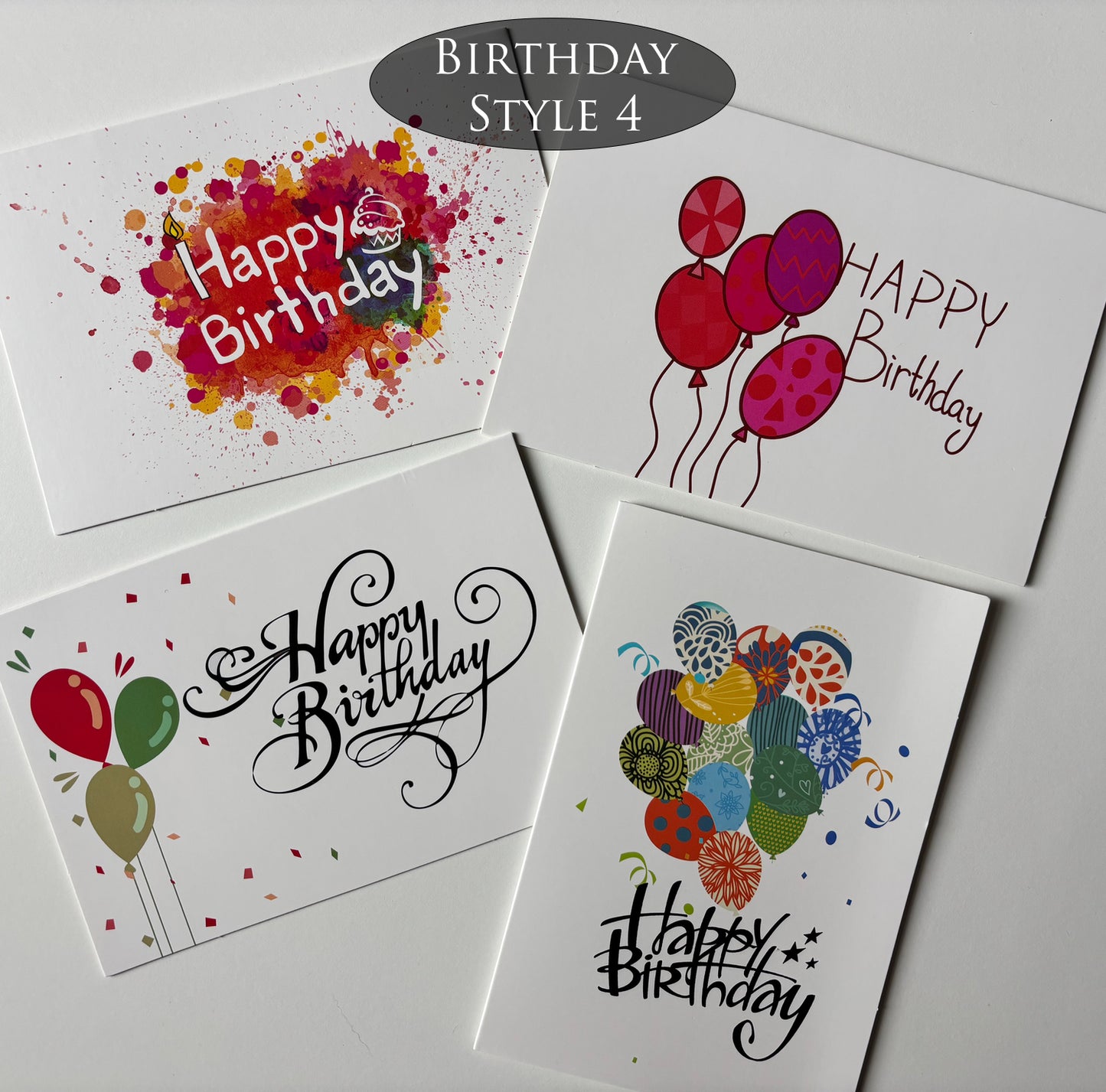 Four birthday cards with general designs on a white background